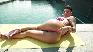 Hottest pornstar Christy Mack enjoys a hot day in the sun