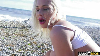 Kyra Hot on the beach shakes her big ass on the hard rod