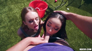 Daisy Stone and Scarlett Bloom suck cock and lick balls