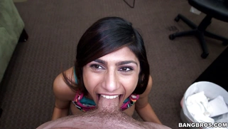 Mia Khalifa maintains eyecontact while swallowing that shaft