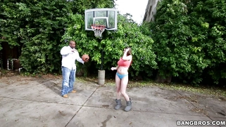 Brooklyn Chase posing and playing basketball outdoor