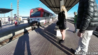 Kyra Hot is flashing her big fake boobs on the railway platform