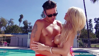 Blonde barbie bimbo Kayla Kayden gets covered with milk at the pool