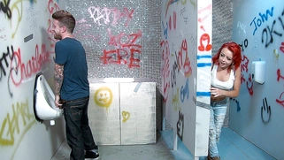 Kinky redhead Billie Rai spies on a hot peeing dude