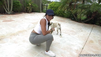 Diamond Kitty is walking with her dog and flashing her giant glutes