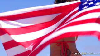Ava Addams wearing bikini poses with the Flag of America