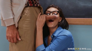 Bella Rolland deepthroats the cock in the classroom