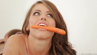 Dana Vespoli saddles Adriana Chechik for a ride, probing her anus with a carrot