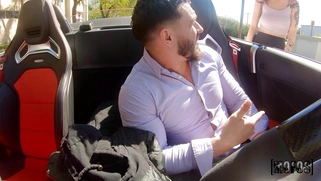Melody Foxx is jerking and sucking Peter Green's cock in the car