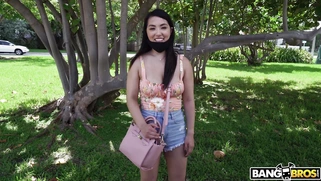 Asian Mina Moon is getting picked up outdoors