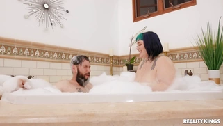 Alexxxis Allure is sucking Tommy Pistol's cock in the bathtub
