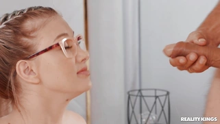 Emily Right in glasses deepthroats the big cock