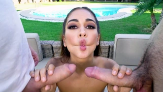 Ginebra Bellucci is sucking two cocks poolside