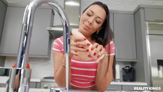 Rachel Starr is playing with the dildo in the kitchen