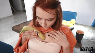 Mimi Bloom is playing with the banana