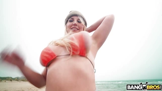 Blondie Fesser shows off her big ass on the beach