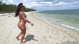 Two big assed Latinas Spicy J and Miss Raquel frolic in the sun and the sand