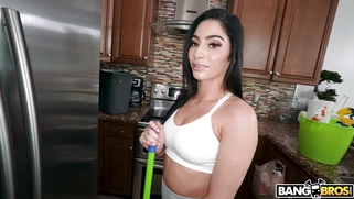 Maid Jasmine Vega is cleaning the kitchen