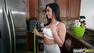 Maid Jasmine Vega is cleaning the kitchen