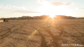 Nikki Benz whips out her juggs and has some dune buggy action in the desert