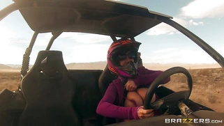 Nikki Benz whips out her juggs and has some dune buggy action in the desert