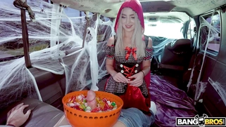 Britt Blair and Peter Green put on Halloween costumes in the BangBus