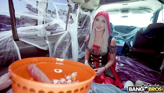 Britt Blair and Peter Green put on Halloween costumes in the BangBus