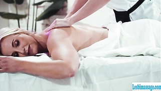 Brunette masseuse licks her milf client