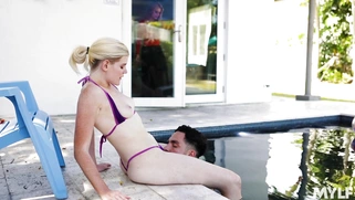 Nikki Sweets gets her pussy licked by Peter Green in the pool