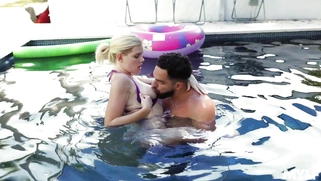 Nikki Sweets gets her pussy licked by Peter Green in the pool