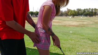 Karla Kush teasing her golf instructor with her short skirt