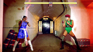 Christen Courtney as Cammy and Rina Ellis as Chun Li are making out