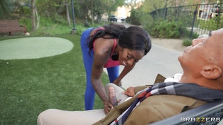 Ebony Mystique gives blowjob to Chong Dong outdoors