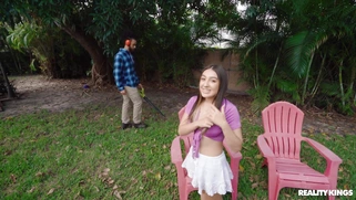 Violet Gems is sucking black cock outdoors