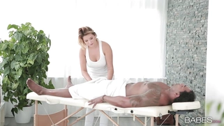 Anna Polina is sucking black dick on massage table