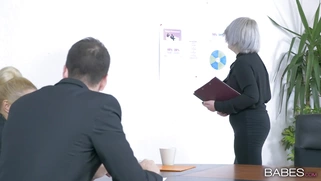 Cherry Kiss is sucking Kai Taylor's cock in the office