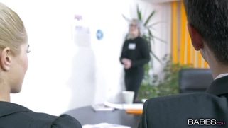 Cherry Kiss is sucking Kai Taylor's cock in the office