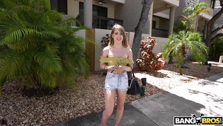 Alexa Kiss is getting picked up outdoors