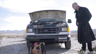 Nikki Benz comes out and inspects Mr. Lawless's car