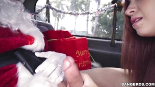 Kiley Jay sucking Santa's cock on the backseat