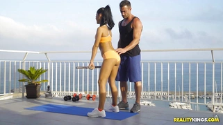 Apolonia Lapiedra and her private trainer are working out on the rooftop