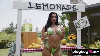 Big boobed naked babe selling lemonade