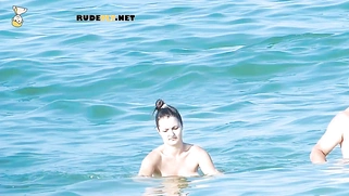 Fresh young nudist chicks caught on a voyeur camera