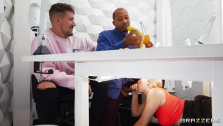 Kay Lovely is sucking black cock under the table