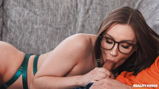 Jazmin Luv in glasses is sucking Damon Dice's cock