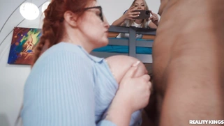 Abigaiil Morris in glasses is sucking huge black cock