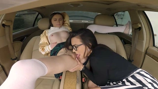 Sia Wood gets her pussy licked by Ivy Ireland in the car