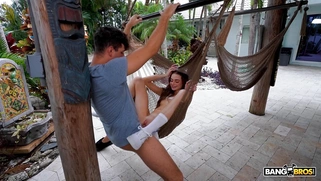 Nikki Nicole gets banged by Kai Jaxon on the padio swing