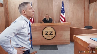 Kylie Rocket is sucking Mick Blue's cock in the courtroom