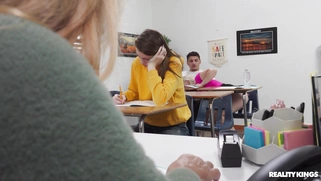 Maisey Monroe is sucking Victor Ray's cock in the classroom